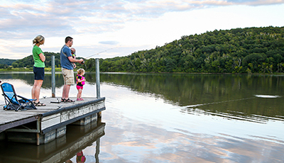 Family fishing from a pier (courtesy Eloisa Callender)