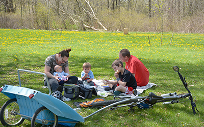 Family picnic on a blanket at CamRock County Park