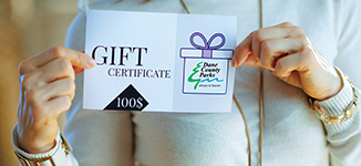 Person holding a gift certificate